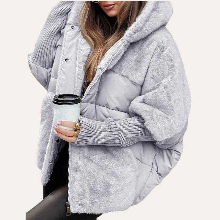 Damen Steppjacke mit Kapuze, Kunstfell und Strickärmeln | Vestea