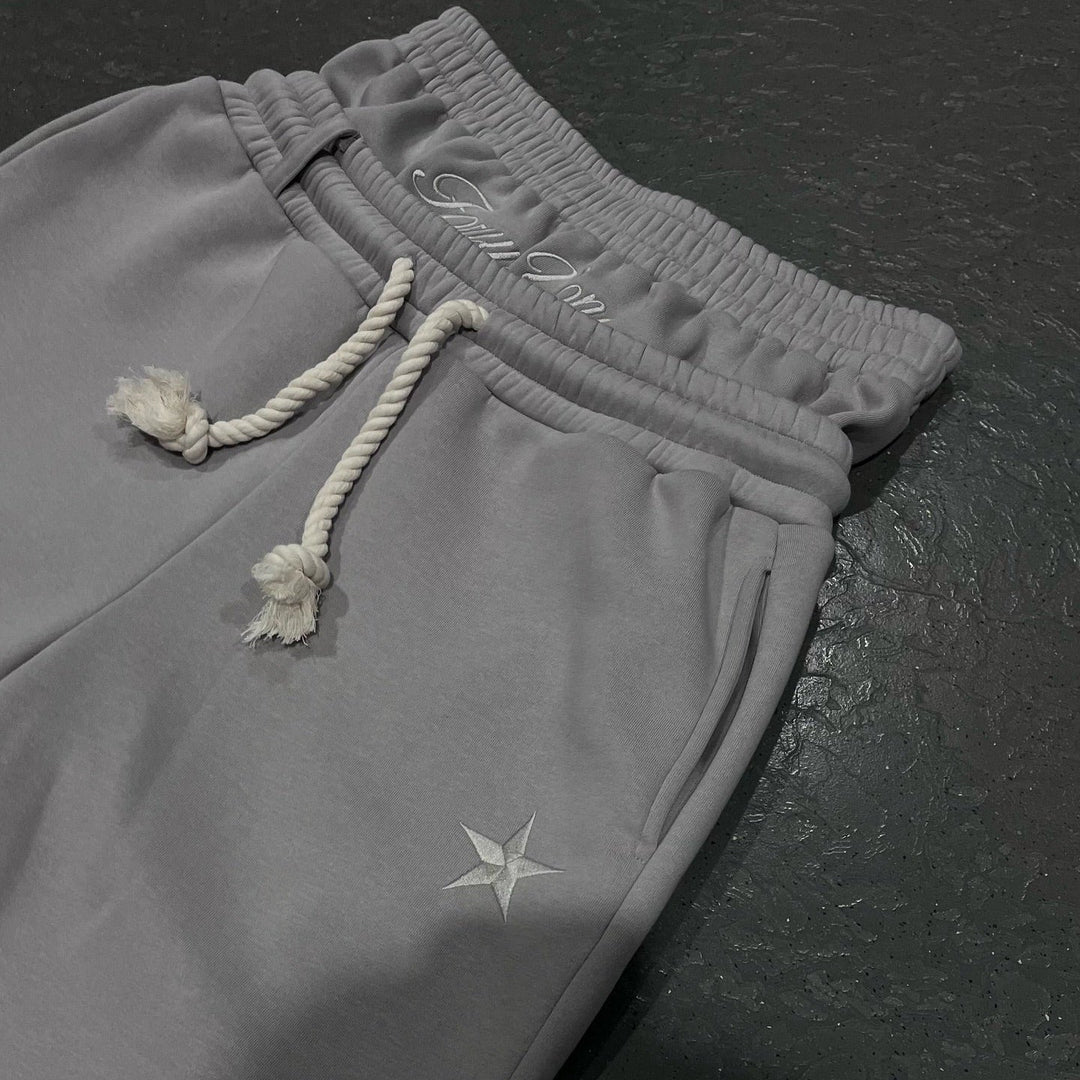 Jogging unisexe coupe ample taille élastique cordon poches décontracté