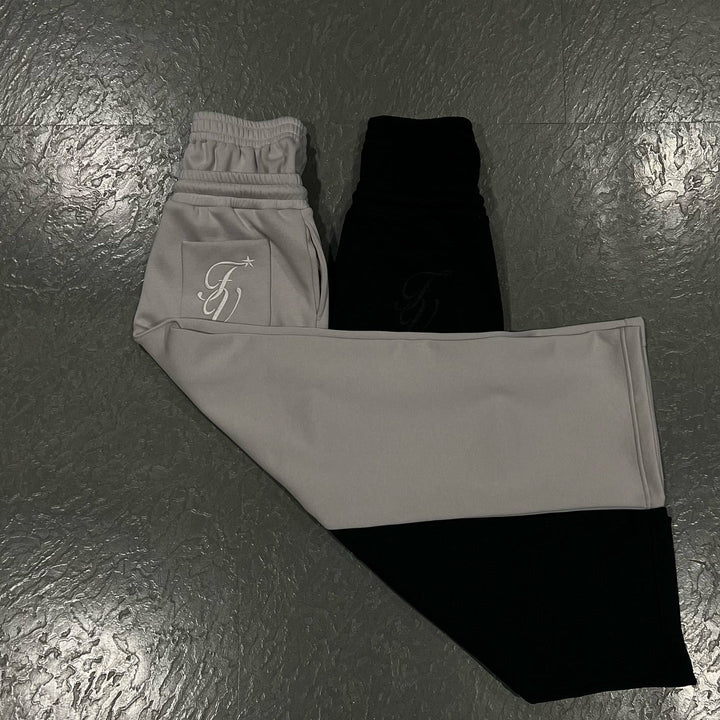 Jogging unisexe coupe ample taille élastique cordon poches décontracté