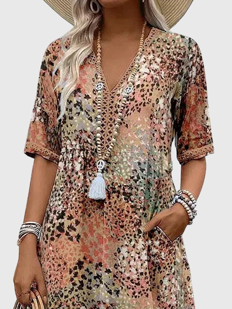 Robe midi fleurie sans manches à col en V pour femme