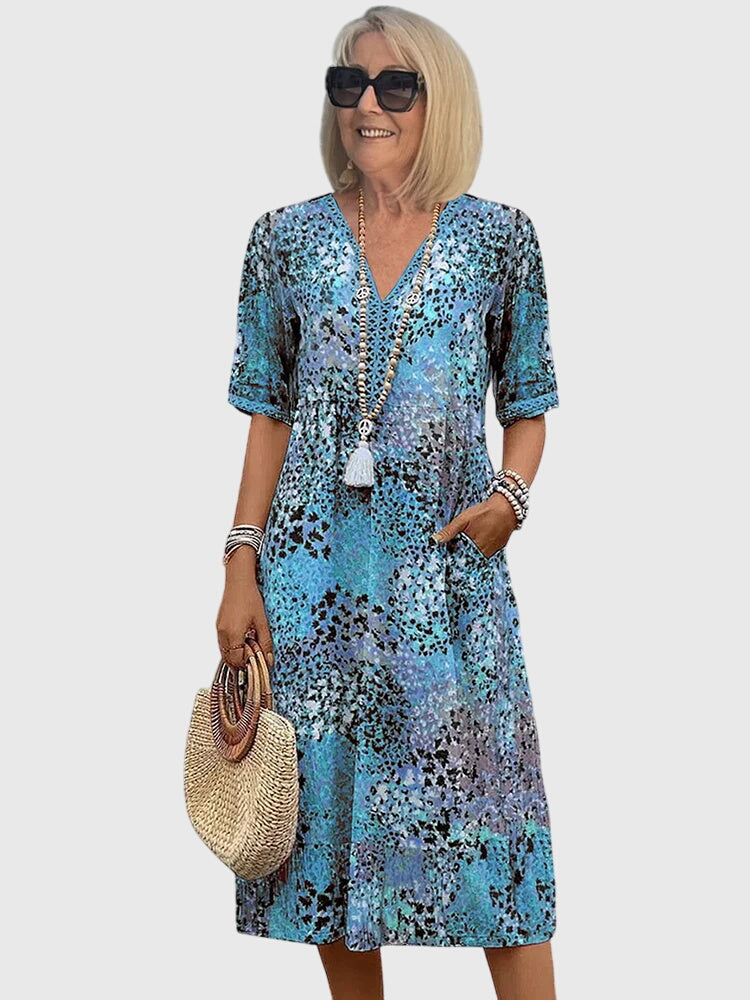 Robe midi fleurie sans manches à col en V pour femme