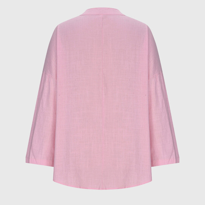 Camisa femenina sin mangas fluida con botones casual