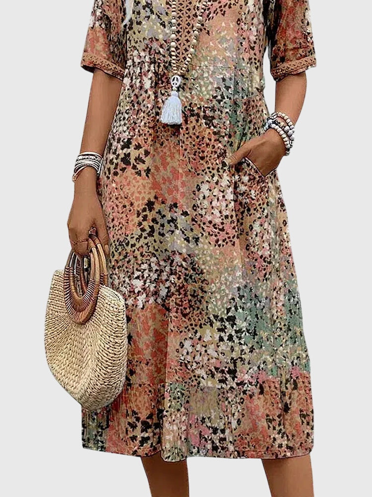 Robe midi fleurie sans manches à col en V pour femme