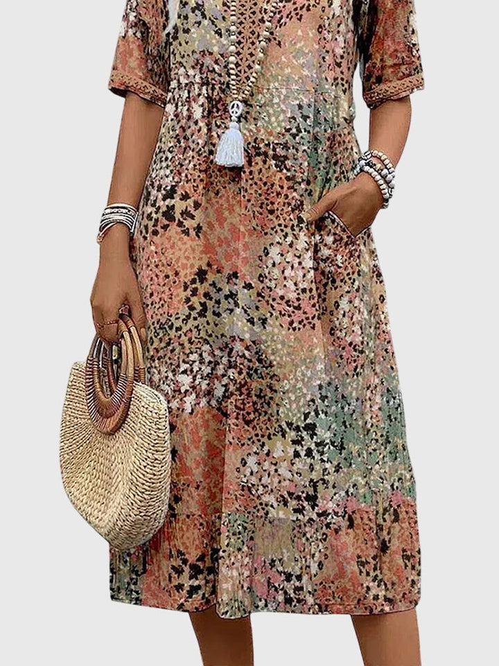 Robe midi fleurie sans manches à col en V pour femme