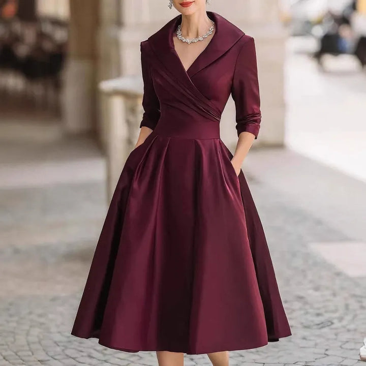 Vestido Midi Elegante con Escote en V y Manga Tres Cuartos