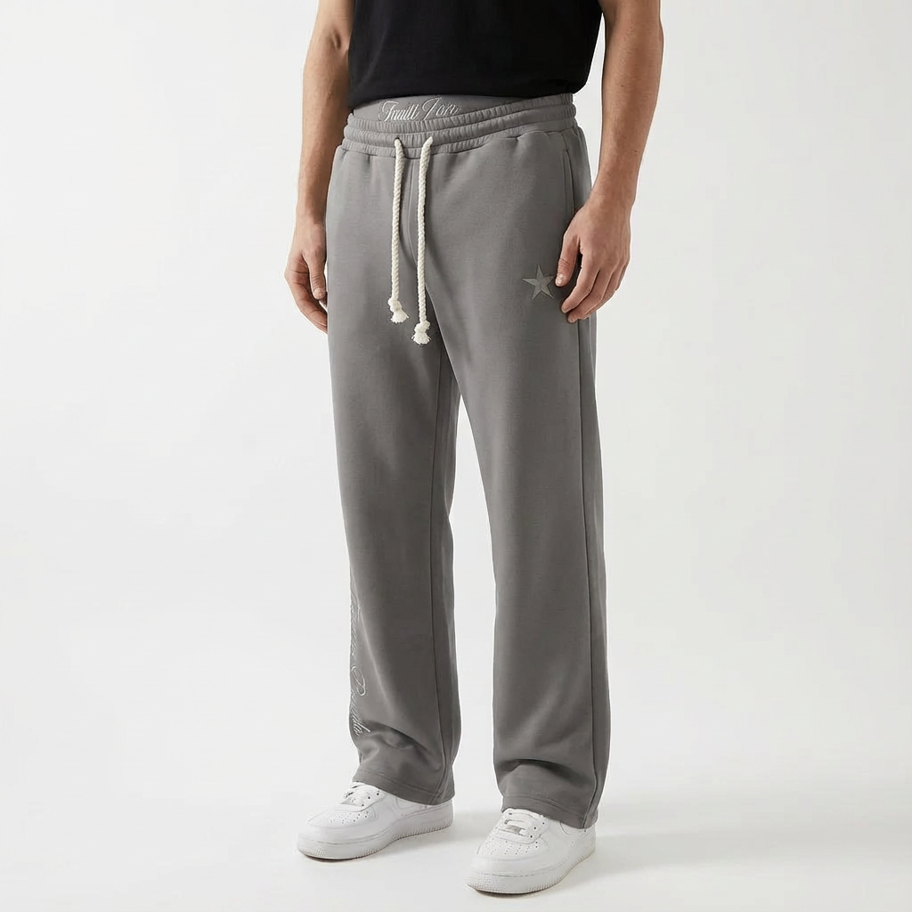 Jogging unisexe coupe ample taille élastique cordon poches décontracté