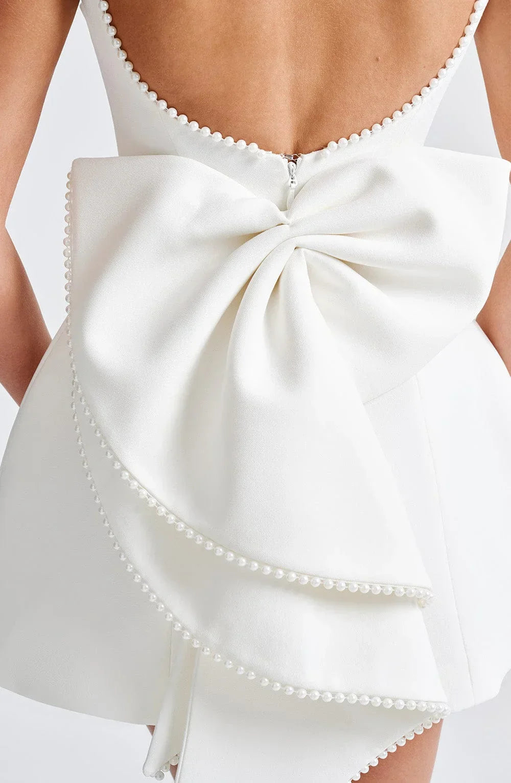 Robe courte femme sans manches avec nœud dans le dos